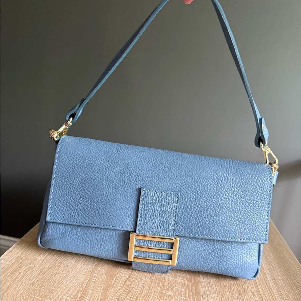 Elegant Blue Crossbody Bag with Gold Accents